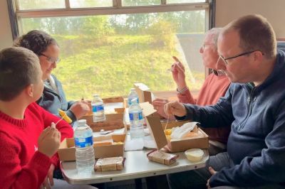 Family enjoying fish and chips