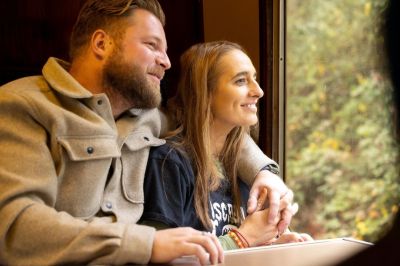 Couple enjoying the view out of the train window