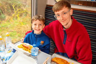 Couple enjoying the view out of the train window